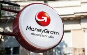 A round MoneyGram store sign featuring its signature red and white logo with the tagline "money transfer" appears alongside a caption announcing MoneyGram's integration with the Solana blockchain via its new "Ramps" service, bringing global cash-to-crypto conversion capabilities to the Solana ecosystem through partner wallet Rift.