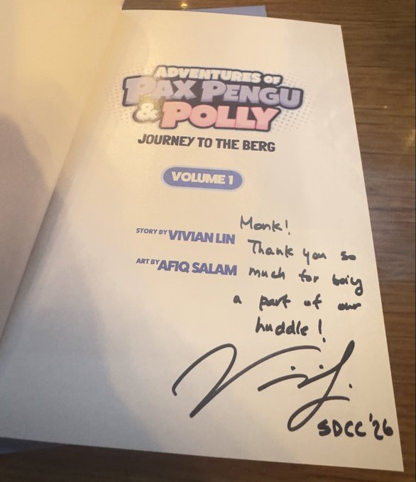 The title page of 'Adventures of Pax Pengu & Polly: Journey to the Berg, Volume 1' by Vivian Lin and Afiq Salam, featuring a handwritten signature and note to 'Monk!' dated SDCC '26.