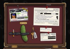 A dark red bulletin board or case displaying various papers, notes, and what appears to be a small green plush pickle figure secured with a strap.