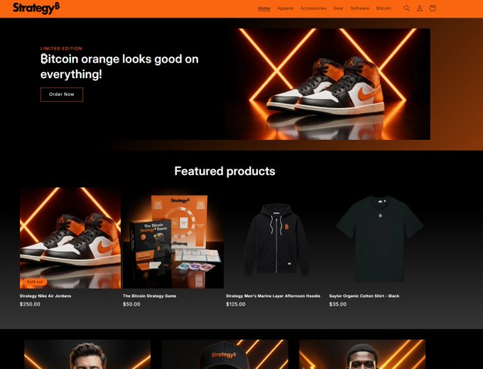 This image shows the StrategyB (formerly MicroStrategy) online merchandise store, featuring a "Limited Edition" Bitcoin orange sneaker ad and products like "Strategy Nike Air Jordans" ($250), "The Bitcoin Strategy Game" ($50), "Strategy Men's Marine Layer Afternoon Hoodie" ($125), and "Saylor Organic Cotton Shirt" ($35). The caption humorously highlights the irony noted in the post: despite MicroStrategy being a major Bitcoin advocate, the official StrategyB store ironically accepts only traditional fiat currency rather than Bitcoin for its Bitcoin-themed merchandise.