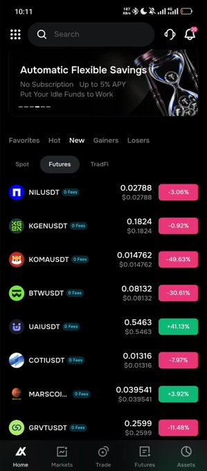 A cryptocurrency trading app screenshot showing the 'Futures' tab with various coins like NILUSDT (-3.06%), KGENUSDT (-0.92%), KOMAUSDT (-49.63%), and others displayed.