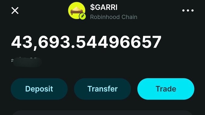 A screenshot of a cryptocurrency wallet interface showing a balance of 43,693.54496657 for the token '$GARRI' on the Robinhood Chain, with Deposit, Transfer, and Trade buttons.