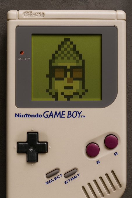 A vintage Nintendo Game Boy displaying a pixelated character with sunglasses on its green screen, featuring the classic "Nintendo GAME BOY™" branding alongside its iconic D-pad, A/B buttons, and Select/Start controls. The retro handheld console in the image perfectly captures the nostalgic "GM" sentiment, representing a beloved relic from the late 1980s/early 1990s gaming era.