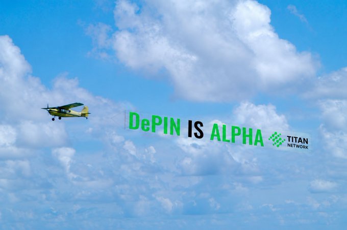 A yellow and white propeller aircraft pulls a banner reading "DePIN IS ALPHA" with the Titan Network logo against a bright blue, cloud-filled sky, visually reinforcing the post's message that DePIN is alpha.