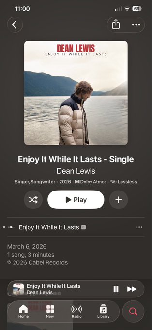 A screenshot of a music streaming app playing "Enjoy It While It Lasts" by Dean Lewis, a 2026 single released on Cabel Records with Dolby Atmos and Lossless audio quality.