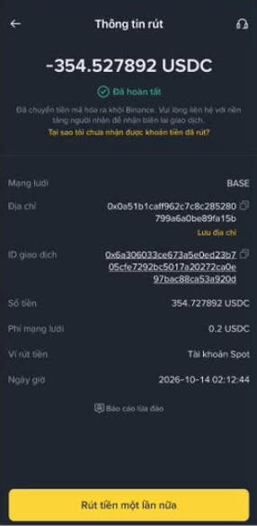 A mobile screenshot in Vietnamese showing withdrawal information ('Thông tin rút') for -354.527892 USDC on the BASE network, with details like transaction ID, network fee (0.2 USDC), and a yellow 'Rút tiền một lần nữa' (Withdraw one more time) button.
