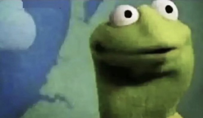 The image shows a low-quality, highly pixelated screenshot of Kermit the Frog with a bewildered, wide-eyed stare, commonly used as a reaction meme for awkward silence. It pairs well with the post's humor about sitting silently in a crypto discussion while desperately wanting to interject, as Kermit's frozen expression perfectly captures the feeling of holding back a thought while the conversation continues around you.