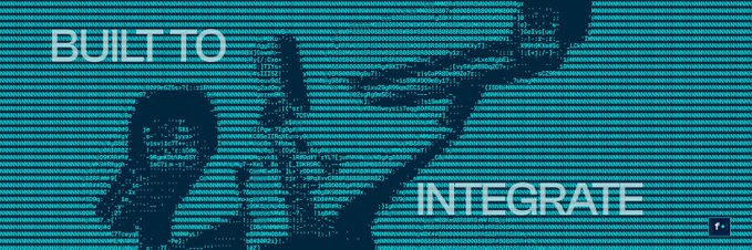 A teal pixelated graphic featuring the text 'BUILT TO INTEGRATE' alongside abstract geometric shapes.