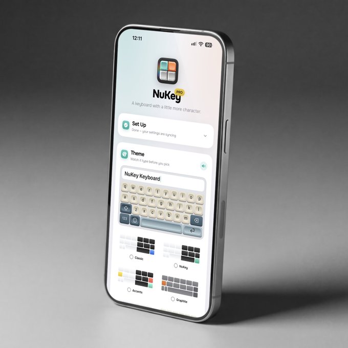 The image shows a smartphone displaying the NuKey keyboard app's setup screen, featuring a "NuKey Pro" logo with the tagline "A keyboard with a little more character," along with a "Set Up" sync option and four theme choices (Classic, NuKey, Accentra, and Graphite). This visual showcases the nearly-completed app UI referenced in the update, highlighting the theme selection feature as one of the final design elements before the awaited launch.