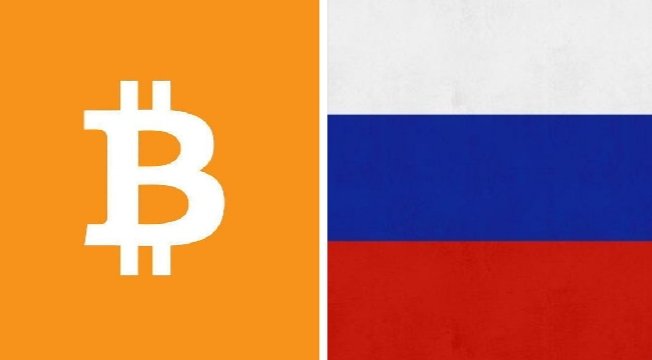 A split graphic shows the orange Bitcoin (₿) logo on the left alongside the white, blue, and red Russian flag on the right, symbolizing Russia's recent decision to ban cryptocurrency mining in Moscow through 2031 to protect its power grid, prioritizing domestic energy stability over the global Bitcoin mining race.