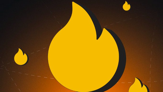 A large yellow flame icon with smaller flames floats against a dark orange background, symbolizing the "HOT" (heat) theme of HOT DAO's token launch on NEAR, as the imagery evokes a sense of momentum, urgency, and rising momentum fitting the post's suggestion that now is the right moment to launch.