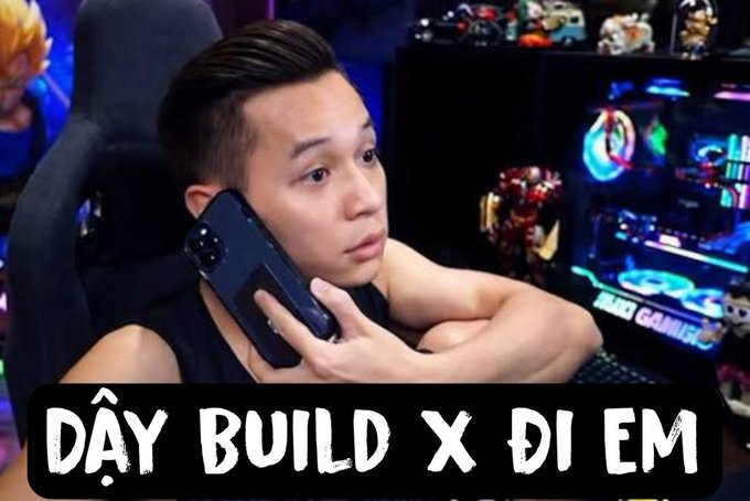 The image features a man sitting at a desk with his cell phone held up to his ear as he talks. The text "Day Build x Diem" can be seen near him, which suggests that this photo was taken during the day on Wednesday morning. The man appears to be engaged in a conversation or discussing something related to the post about building X.