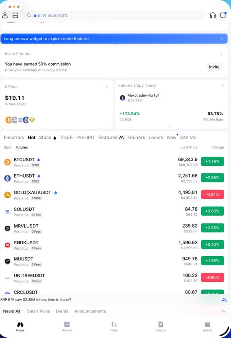 A screenshot of a cryptocurrency trading app showing BTCUSDT Perpetual at $69,343.90 (+1.19%) and ETHUSDT at $2,251.68 (+7.08%), alongside the user's post preview asking if BTC will hit $70,000 today.