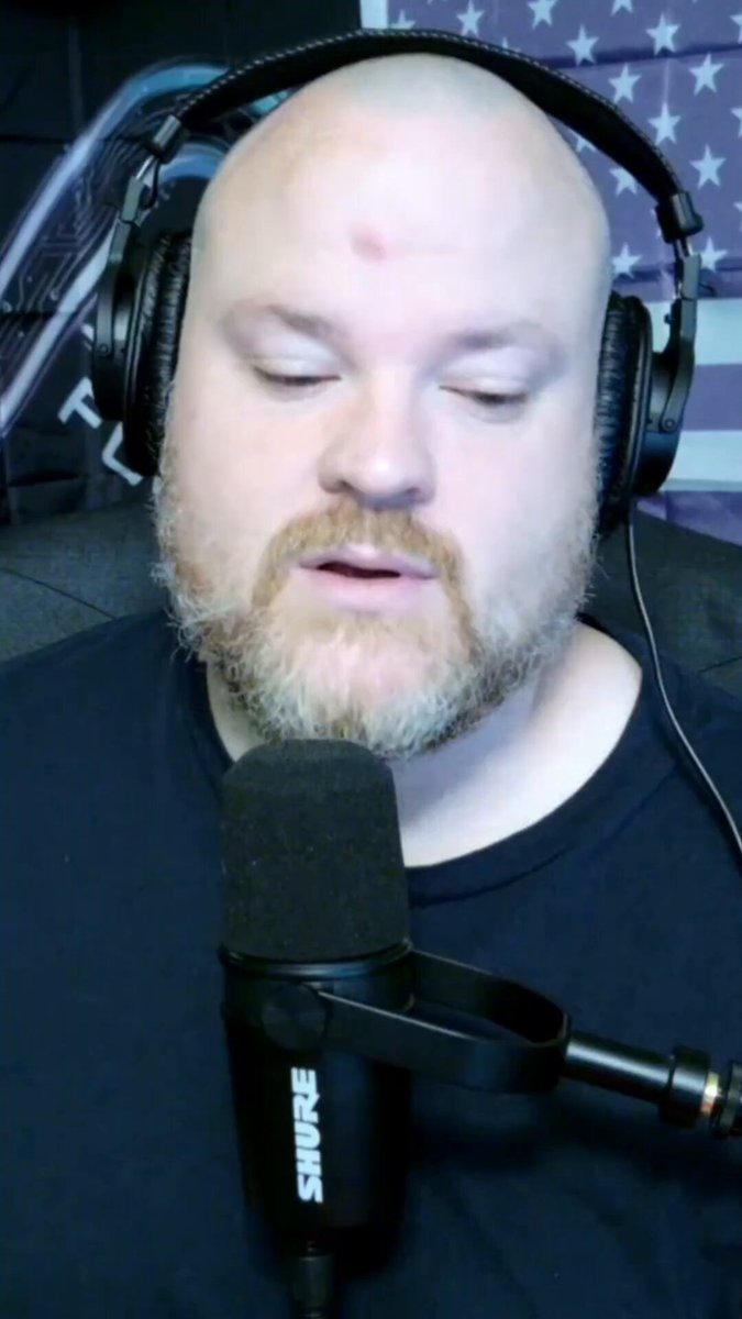 The image features a bald man wearing headphones, possibly listening to music or participating in an online radio show. The caption reads "THE POWER OF DCA ON VOILATILE ASSETS IS INCREDIBLE #SPX6900". This suggests that the man is likely enjoying some form of audio content, such as music or a podcast, while wearing his headphones and possibly engaging with others through the radio station's platform.

The image also contains text elements like "SHRU" and "DCA", which could be related to the radio station or the specific show being broadcasted. The caption provides context about the content of the image and its connection to the post, but it does not provide any additional information beyond that.
