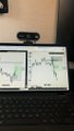 A small blurry image shows a laptop screen displaying what appears to be flight tracking or map software, with a webcam visible above.