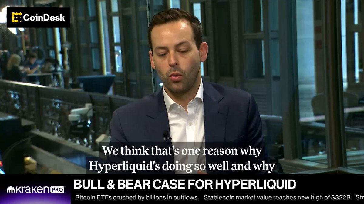 The image features a man wearing a suit sitting at a desk with a computer screen behind him. The text displayed on the screen reads "We think that one reason why Hyperliquid's doing so well and why Bull & Bear Case for HYPERLiquid is created by Bitcoin ETA crushed by Bitcoins in outflows". This suggests that the man might be discussing the impact of Bitcoin on the cryptocurrency market, specifically focusing on the recent news about Bitcoin ETA being crushed. The image also includes a link to a video or article related to this topic.