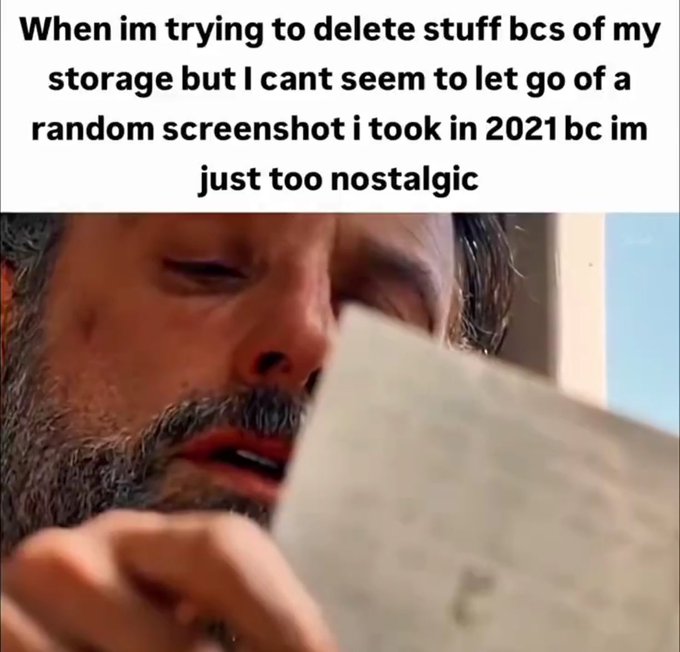 A meme featuring Keanu Reeves from the movie "The Polar Express" intently reading a letter, with text reading "When im trying to delete stuff bcs of my storage but I cant seem to let go of a random screenshot i took in 2021 bc im just too nostalgic." The image humorously illustrates the relatable struggle of holding onto old photos, perfectly matching the sentiment that deleting pictures you never look at feels impossible.