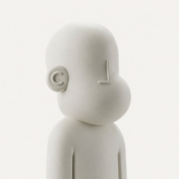 A minimalist white sculptural figure of a bald character in profile, featuring a copyright '©' symbol embossed where the ear would be.