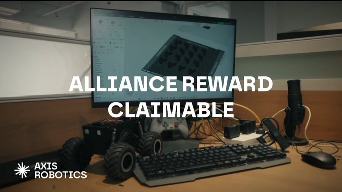 A robotics workspace featuring a monitor displaying 3D modeling software, a small robotic vehicle, a keyboard, and a game controller, with text overlay reading 'ALLIANCE REWARD CLAIMABLE' and the 'AXIS ROBOTICS' logo in the bottom left.