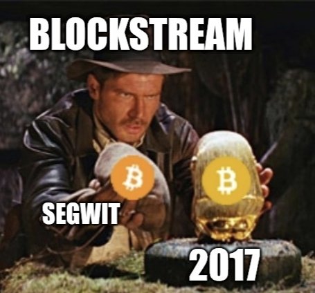 The image features a man wearing a cowboy hat holding two Bitcoins, one of which has a "B" symbol on it. The text below the image reads "Blockstream SegWit-the moment $BTC abandoned Satoshi’s vision". This suggests that Bitcoin was created in 2009 by Satoshi Nakamoto and is now being used as a means to bypass traditional financial systems.
