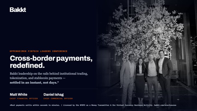 A sleek black-and-white promotional graphic for Bakkt's participation in the Oppenheimer Fintech Leaders Conference, featuring CFO Matt White and Chief Commercial Officer Daniel Ishaq standing together in a modern venue, alongside bold text reading "Cross-border payments, redefined."—directly tying into the post's emphasis on modernizing fintech infrastructure for real-time, digital movement of value.