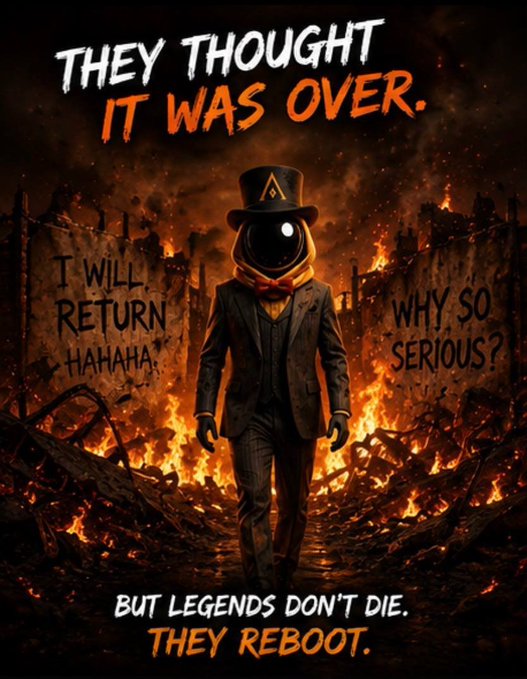 A dramatic poster of a figure in a suit with a black hat reading 'THEY THOUGHT IT WAS OVER. BUT LEGENDS DON'T DIE. THEY REBOOT.' amid flames.