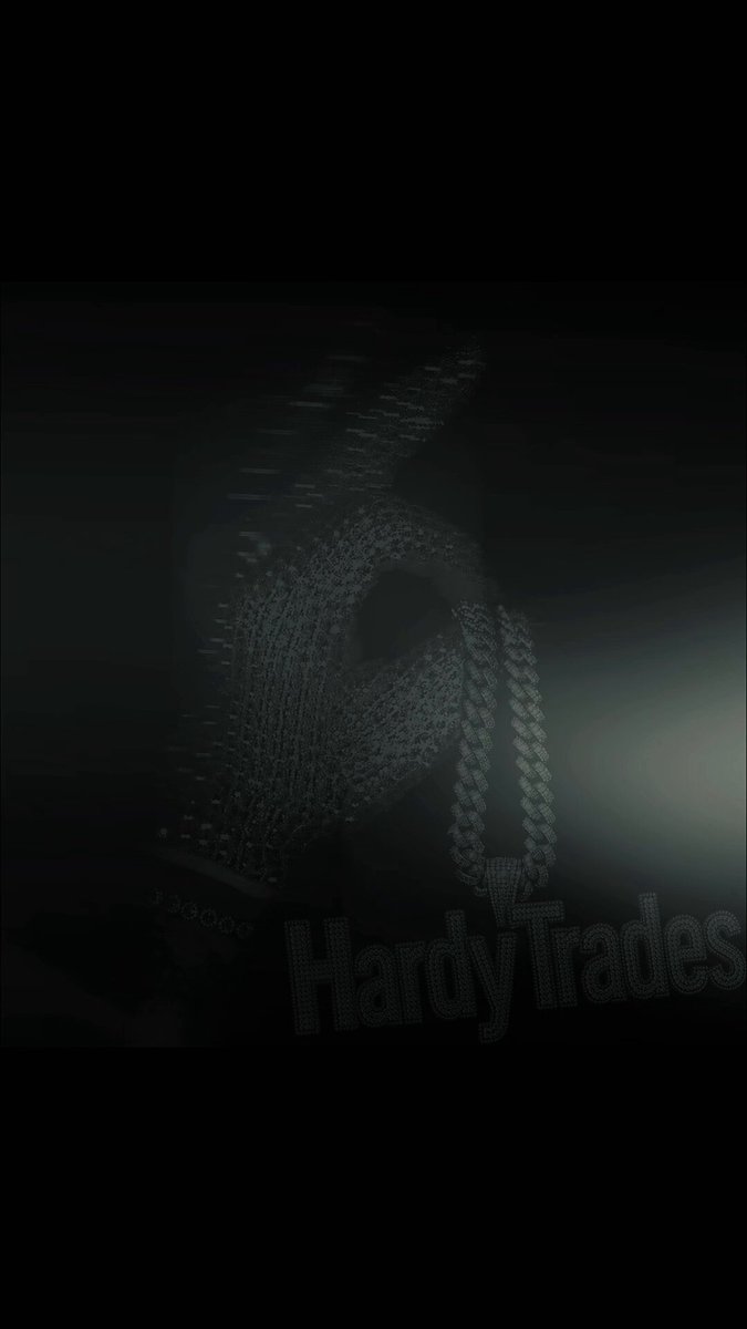 The image shows a close-up view of an advertisement for HARDY TRADES products, with a dark background that makes them stand out prominently. There are various product items displayed within the frame, including a silver chain, a gold bracelet, earrings, and other jewelry pieces placed next to each other against the black backdrop. The close-up nature of the image allows viewers to see the details of these products clearly, highlighting their appeal as fashionable accessories or gifts for special occasions.
