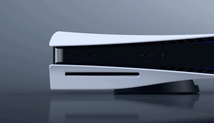 Side profile view of a white PlayStation 5 console with a black disc drive positioned vertically.