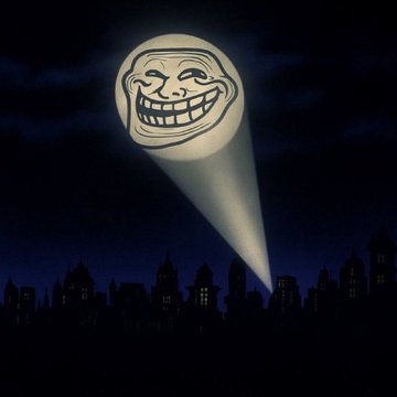 This image depicts the iconic Trollface meme projected onto a dark city skyline like a signal. It humorously relates to the post by symbolizing the "Troll" coin ($troll) as a powerful presence, likely mirroring the excitement and anticipation expressed about its potential.