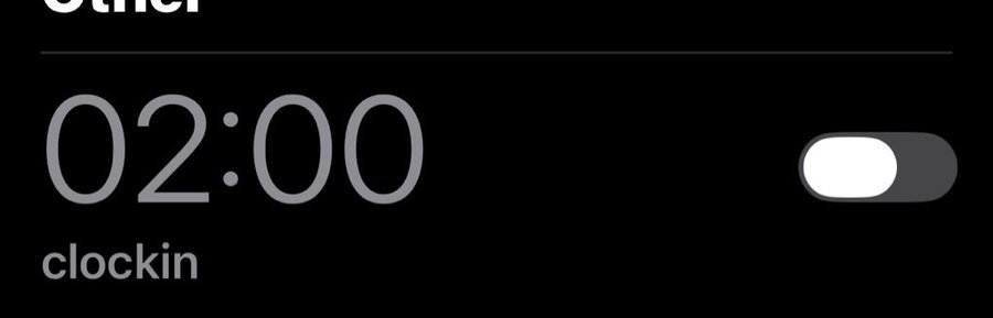 A dark screen showing a timer set to '02:00' with a toggled switch and the text 'clockin' below it.
