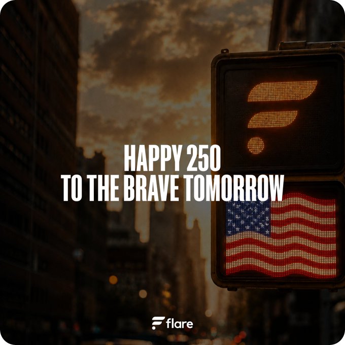 A traffic light displaying an American flag stands against a city skyline at dusk, with text reading "HAPPY 250 TO THE BRAVE TOMORROW" and a "flare" logo at the bottom.