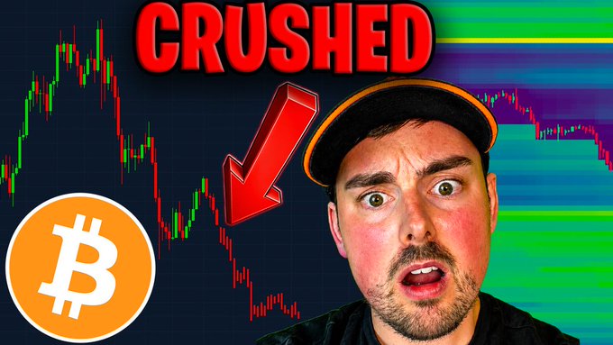 The image shows a person wearing an orange baseball cap with the words "CRushed!" written underneath, possibly indicating the recent collapse of Bitcoin or a similar cryptocurrency. The person appears startled by this news, as shown through their facial expression and body language. This scene is part of a larger image that includes various elements, such as market charts, logos, or other visual content related to the topic of cryptocurrency and its fluctuating value.