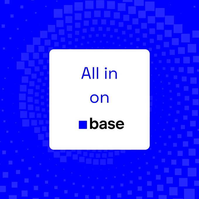 The image features a blue background with white text that reads "All in on @base". This phrase is written in black, which stands out against the blue background. The text is positioned at the center of the image, making it the focal point.