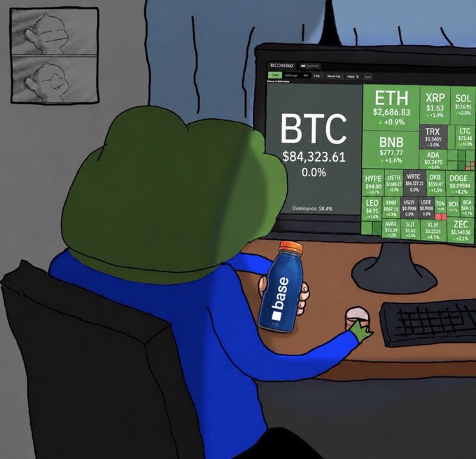 A cartoon illustration of a green frog character at a computer desk viewing a crypto market tracker (showing BTC at $84,323.61 and various other coins), while holding a blue 'base' branded bottle.