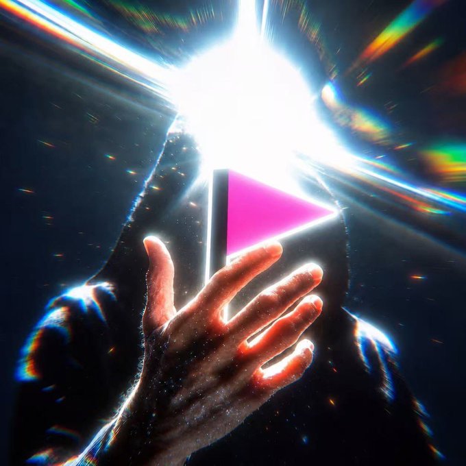 urn of fire, a pink triangle with a black border, and a red circle are illuminated by a bright light against a dark blue background.
