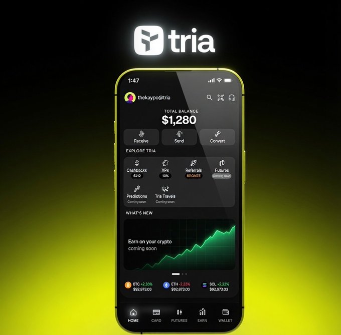 The image shows a yellow smartphone with a black screen displaying information about cryptocurrency exchanges called @useTria. The text of the image includes the claim that "the biggest barrier to crypto adoption was never usability." This statement suggests that the primary obstacle preventing widespread adoption of cryptocurrency is its complicated and confusing user interface, rather than issues related to liquidity or the underlying technology.