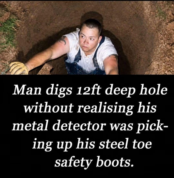 A man in overalls and work gloves stands in a deep dirt hole, looking upward. The text reads: "Man digs 12ft deep hole without realising his metal detector was picking up his steel toe safety boots."