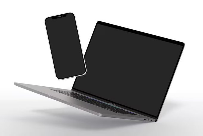A blank black smartphone hovers next to an open laptop with a blank black screen, both set against a white background.