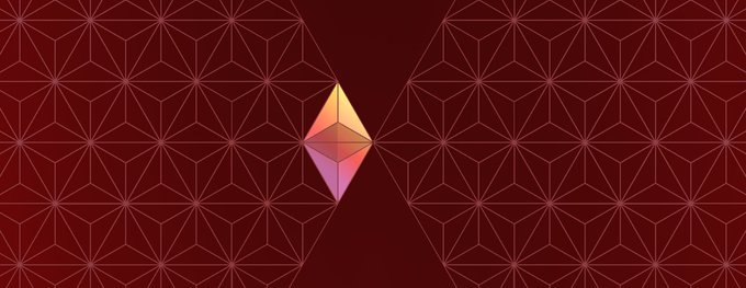 A geometric design featuring a faceted diamond-shaped logo in orange and purple tones centered on a deep red background with triangular mesh patterns.