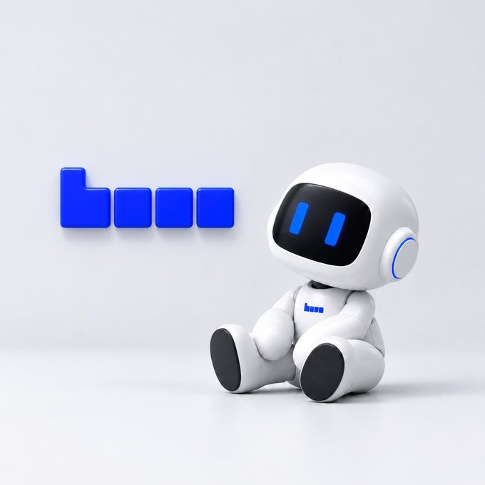 A small, stylized white robot figure with blue digital eyes sitting next to a blue blocky logo that resembles 'b' on a white background.