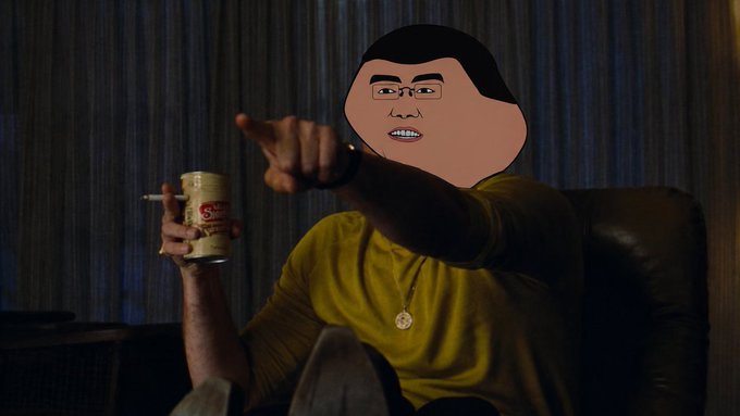A man in a yellow shirt sits in a leather chair holding a can and pointing forward, with an animated cartoon face edited over his own, referencing CZ (Changpeng Zhao), the former Binance CEO, as a nod to the post's mention of him triggering a memecoin bull run on the BSC chain.