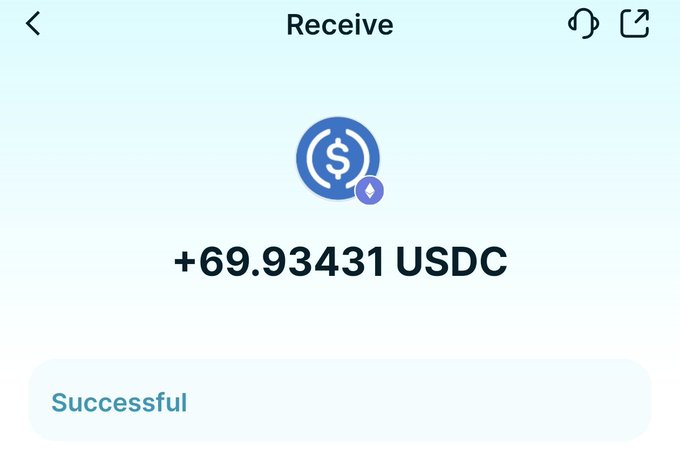 Crypto wallet 'Receive' screen showing a successful transaction of +69.93431 USDC.