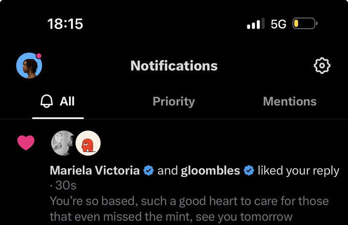 A mobile notification screen showing a like from verified users 'Mariela Victoria' and 'gloombles' with the message: 'You're so based, such a good heart to care for those that even missed the mint, see you tomorrow.'
