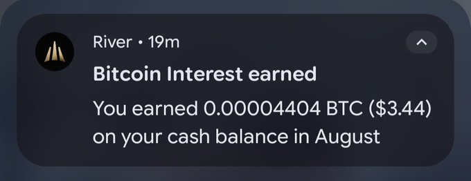 A notification from "River" stating "Bitcoin Interest earned - You earned 0.00004404 BTC ($3.44) on your cash balance in August."
