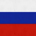 The flag of Russia, consisting of three horizontal stripes of white, blue, and red.