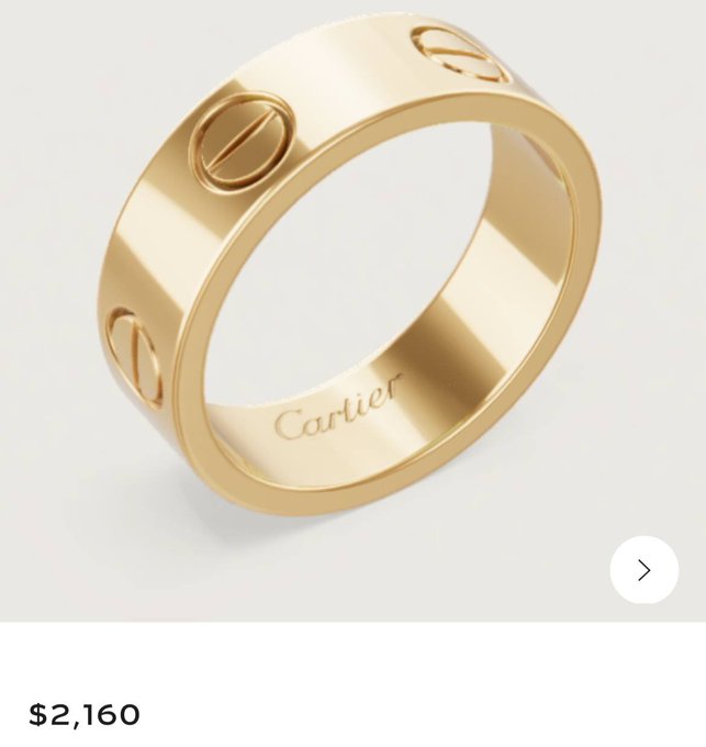 A polished yellow gold Cartier 'Love' band ring displayed against a white background, priced at $2,160.