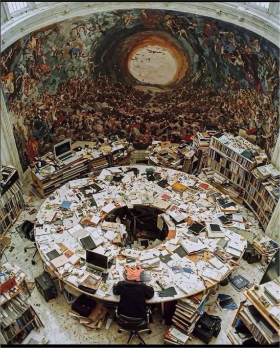 A dramatic wide-angle view of an artist's circular studio filled with scattered books and papers, beneath a domed ceiling painted with a swirling Renaissance-style fresco reminiscent of Dante's Divine Comedy.