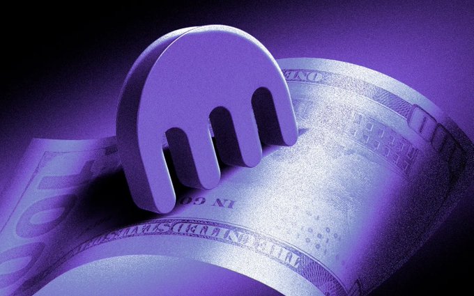Kraken's logo sits atop a rolled U.S. $100 bill, illustrating the cryptocurrency exchange's temporary withdrawal issues and paused deposit services across more than 20 blockchain networks.