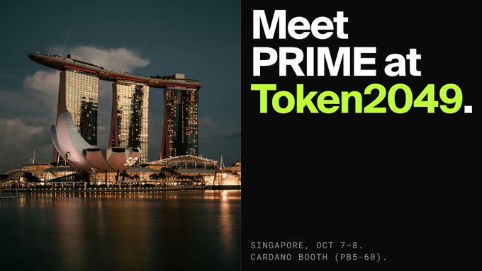 A promotional banner reading 'Meet PRIME at Token2049' featuring an image of Singapore's Marina Bay Sands, dated October 7-8 at the Cardano Booth (PB5-60).
