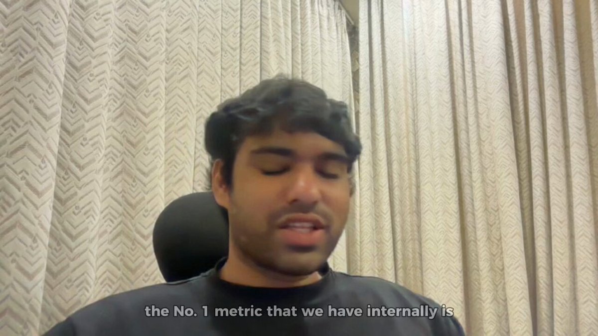 The image shows a man sitting down while talking about a topic, possibly related to sports or business. The text in the image reads "the No. 1 metric that we haveinternally" which could be part of an interview with @solana community member.